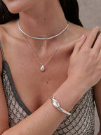 INTERLOCK TWIST STERLING SILVER PLATED BANGLE - SILVER