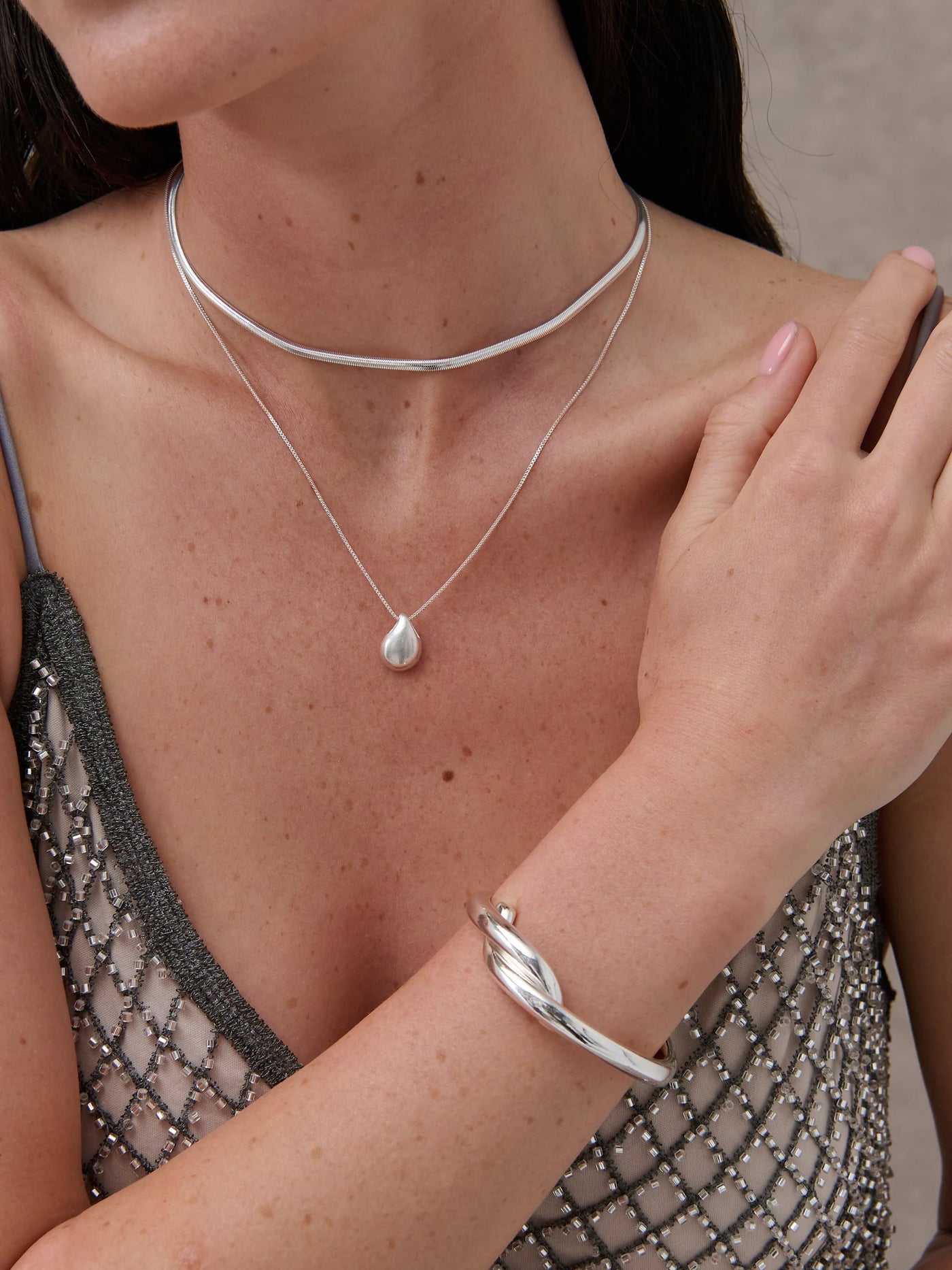 INTERLOCK TWIST STERLING SILVER PLATED BANGLE - SILVER