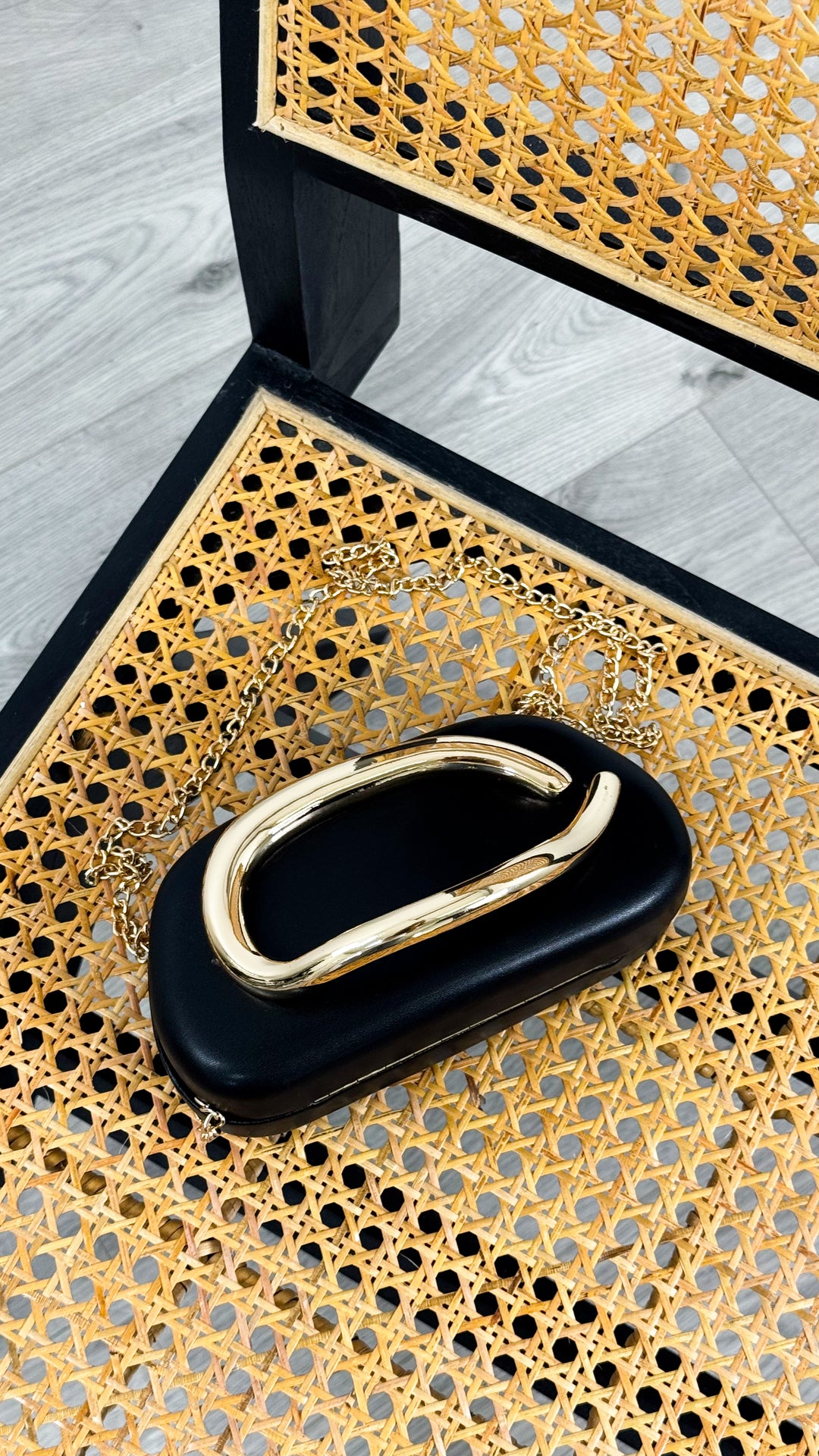 CELINA STATEMENT CLUTCH - BLACK